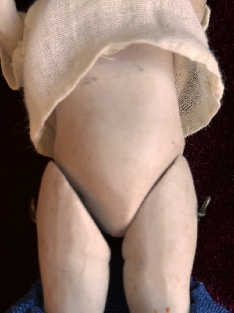 Antique German 4.375” All Bisque Boy Doll with Molded Hair