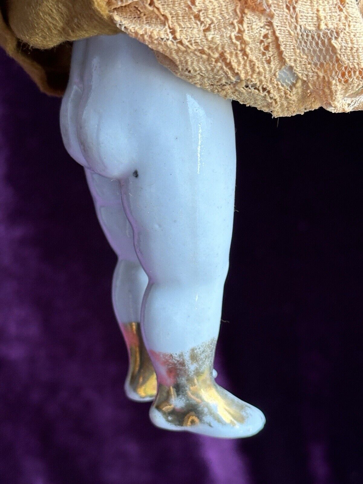 Rare Antique German 6.75” Frozen Charlotte Painted Gold Molded Bow Doll