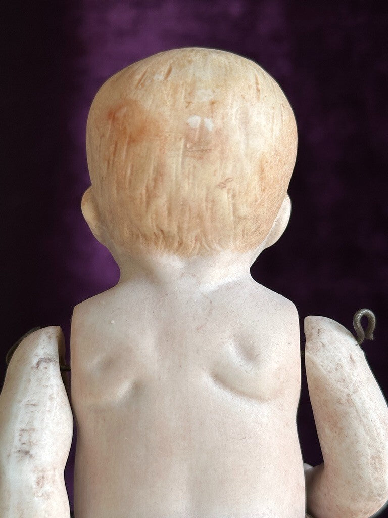 Antique German 5.25” All Bisque Miniature Baby Doll