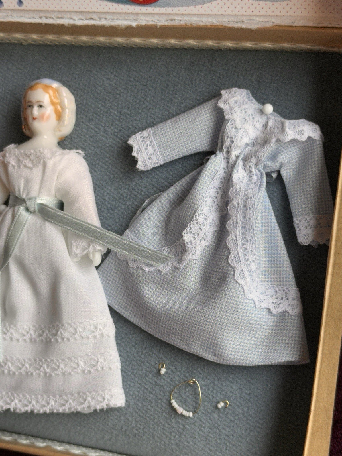 Collectible UFDC Porcelain Repro of China Doll by Rosemarie Snyder with Wardrobe