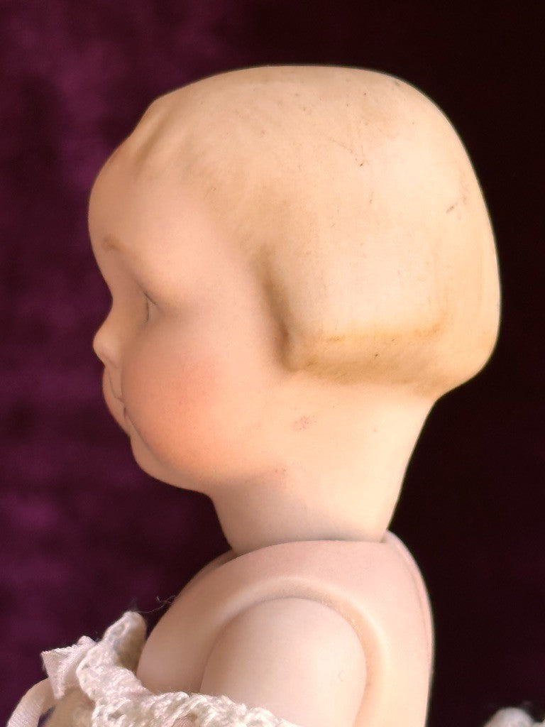 All Porcelain 7” Reproduction of Antique German Armand Marseille Girl 210 Doll