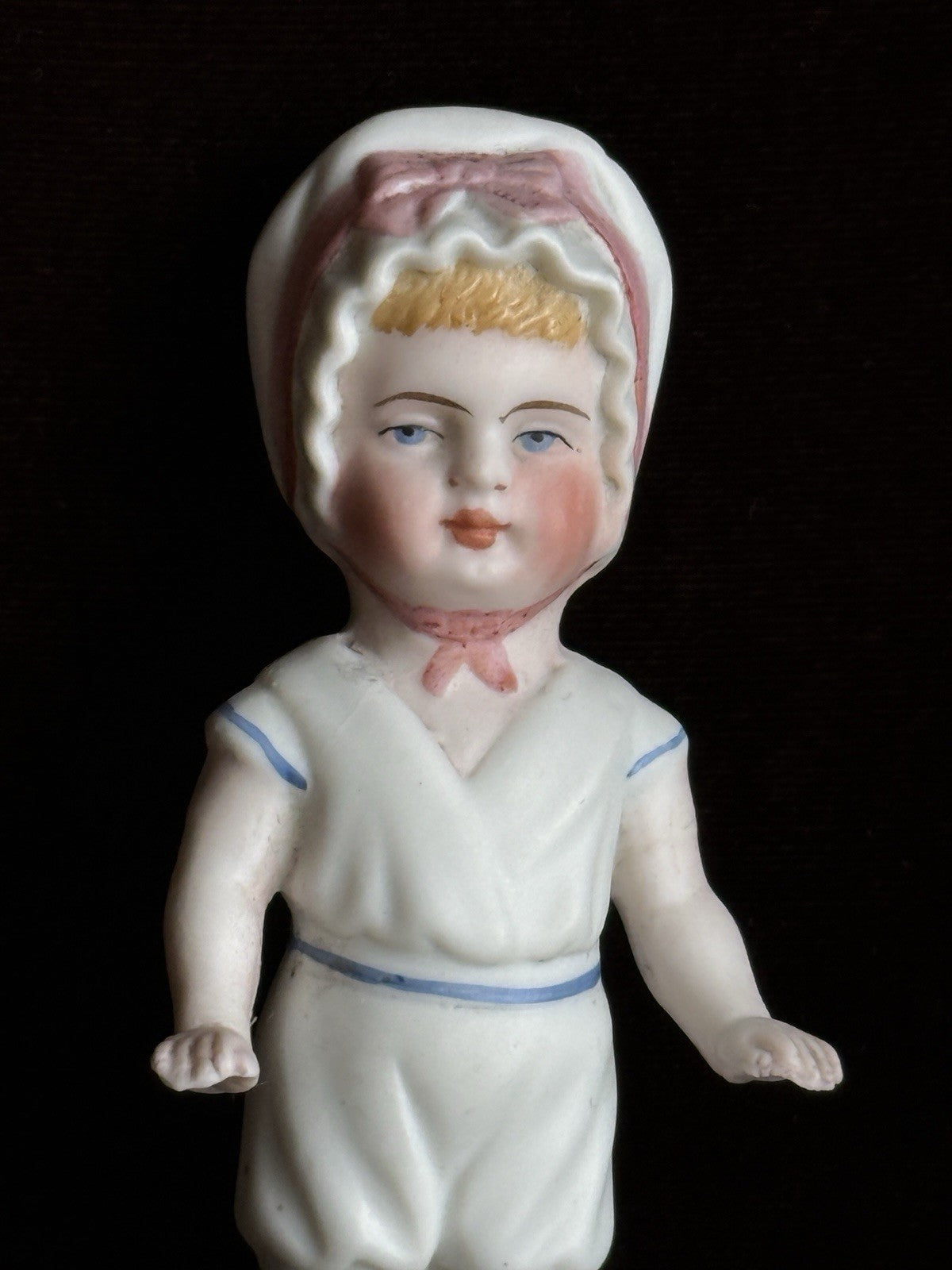Antique German 4” Frozen Charlotte Bisque Doll With Molded Bonnet/Swim Suite