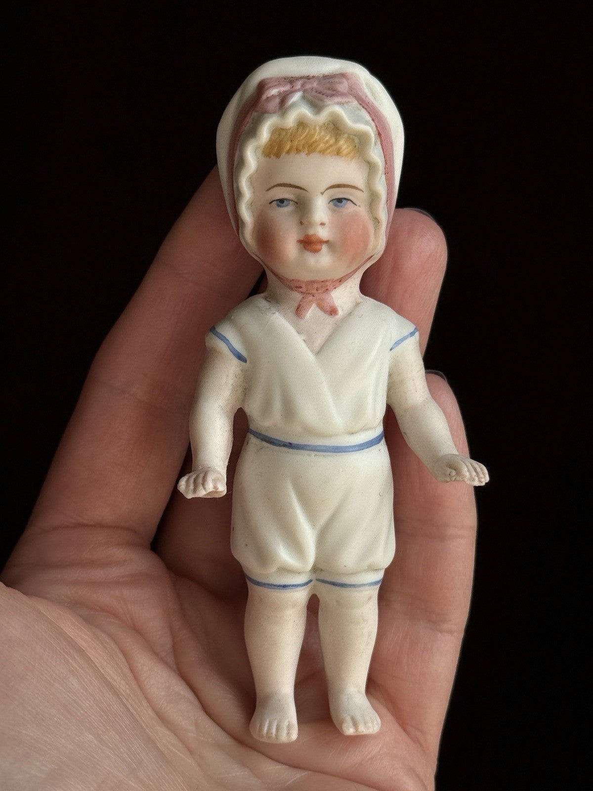 Antique German 4” Frozen Charlotte Bisque Doll With Molded Bonnet/Swim Suite