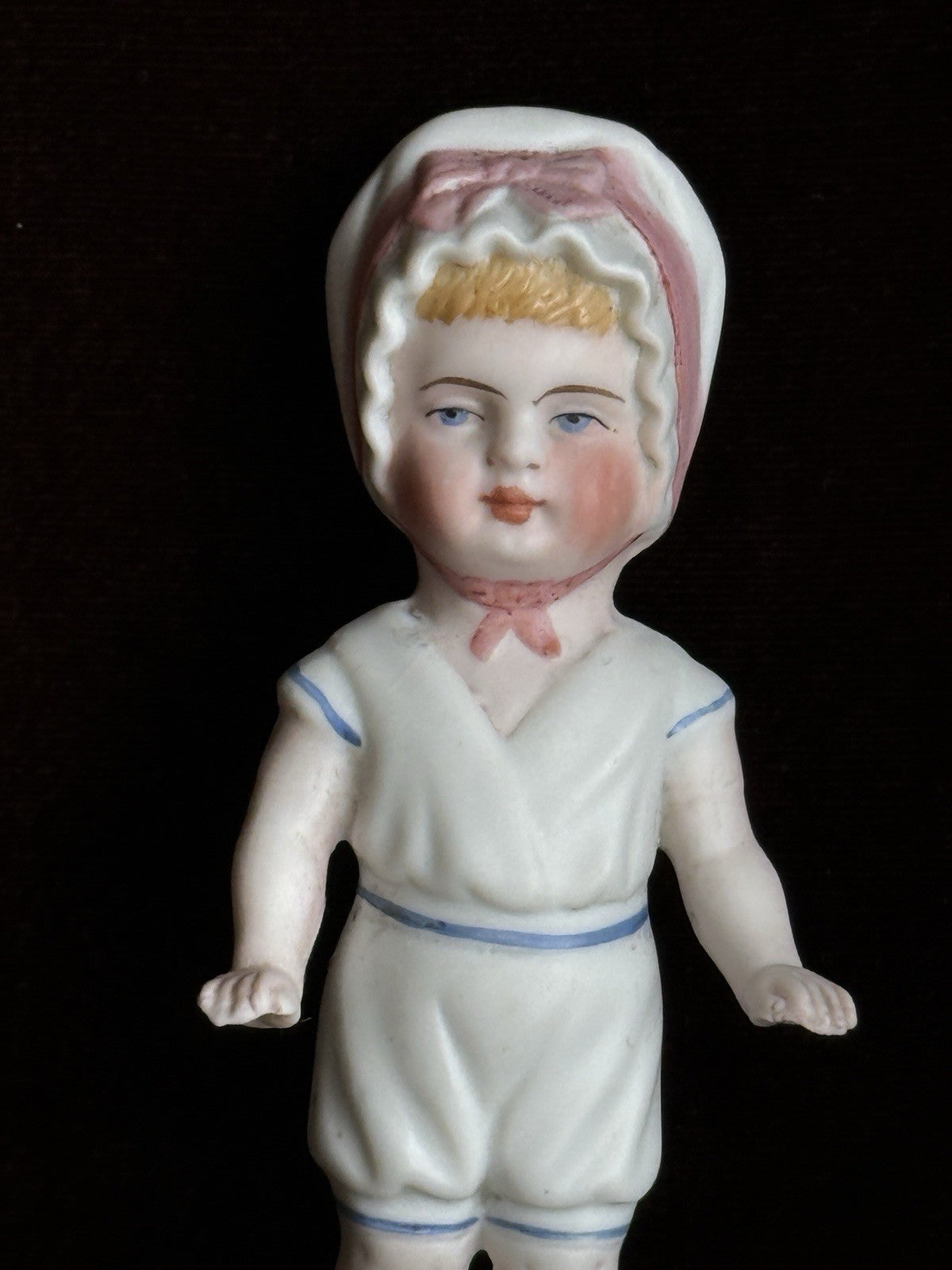 Antique German 4” Frozen Charlotte Bisque Doll With Molded Bonnet/Swim Suite