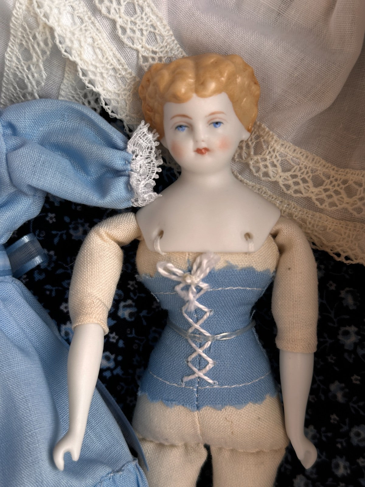 Collectible Porcelain Repro of China Doll by Rosemarie Snyder with Wardrobe