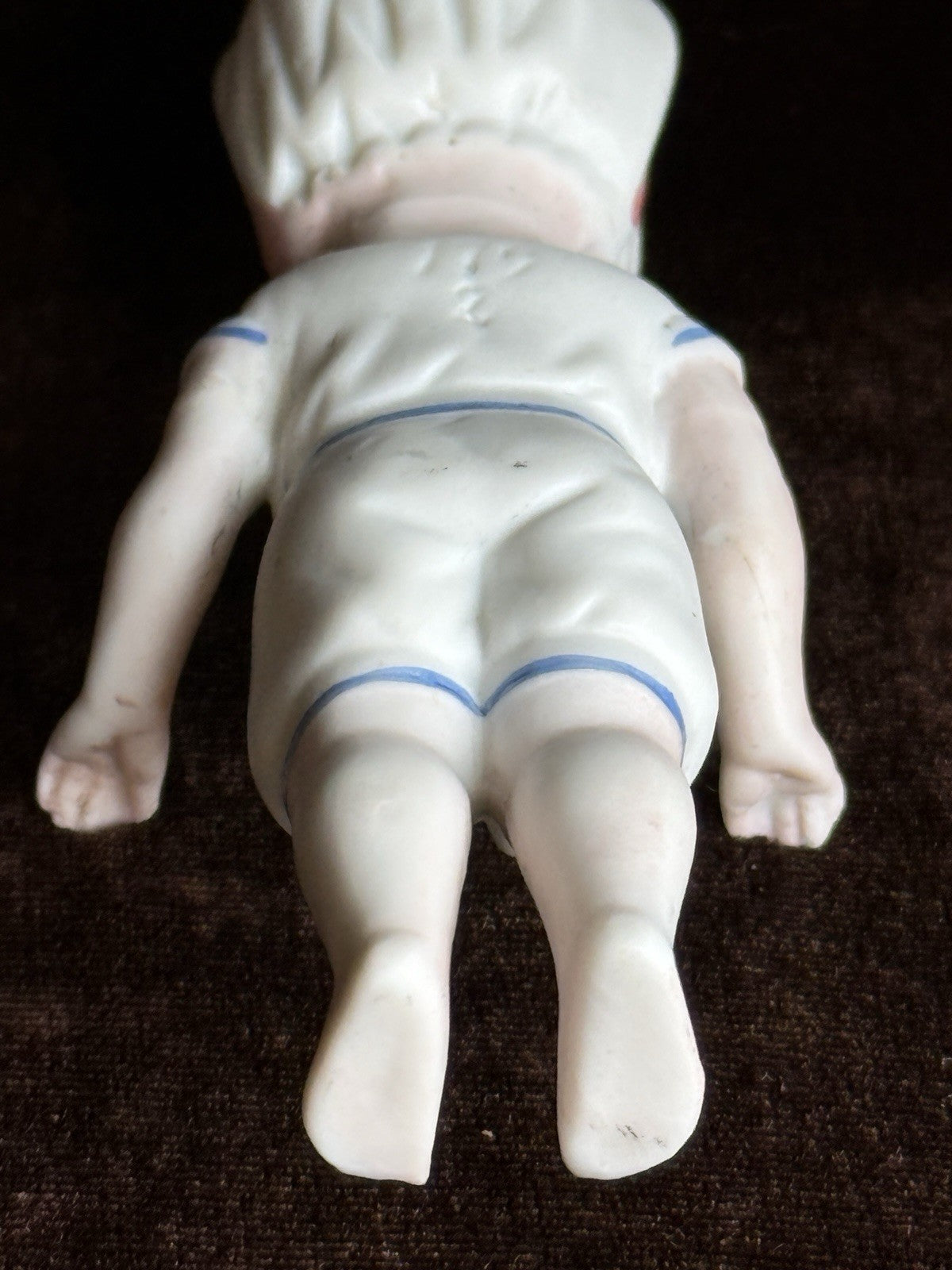 Antique German 4” Frozen Charlotte Bisque Doll With Molded Bonnet/Swim Suite