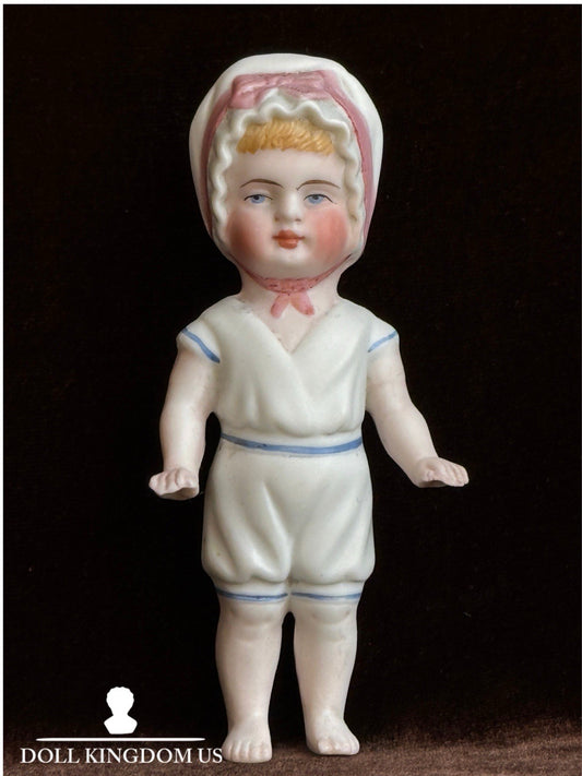 Antique German 4” Frozen Charlotte Bisque Doll With Molded Bonnet/Swim Suite
