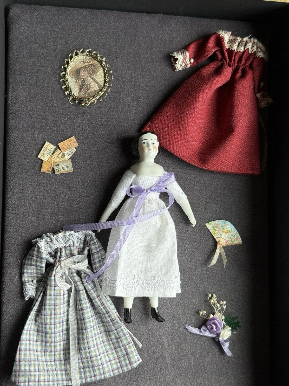 Miniature Porcelain Repro of China Doll by Rosemarie Snyder with Wardrobe Set