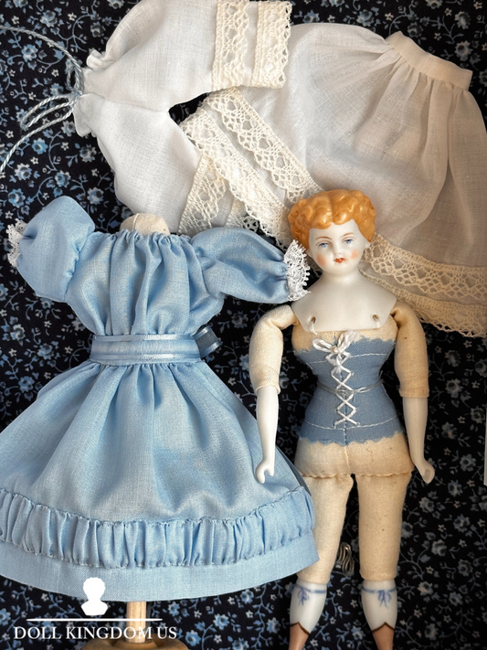 Collectible Porcelain Repro of China Doll by Rosemarie Snyder with Wardrobe