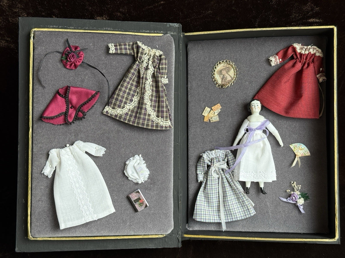 Miniature Porcelain Repro of China Doll by Rosemarie Snyder with Wardrobe Set